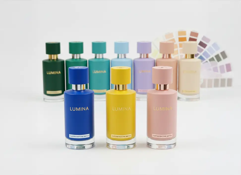 Perfume bottles in a range of Pantone and brand-matched colors, illustrating custom color matching
